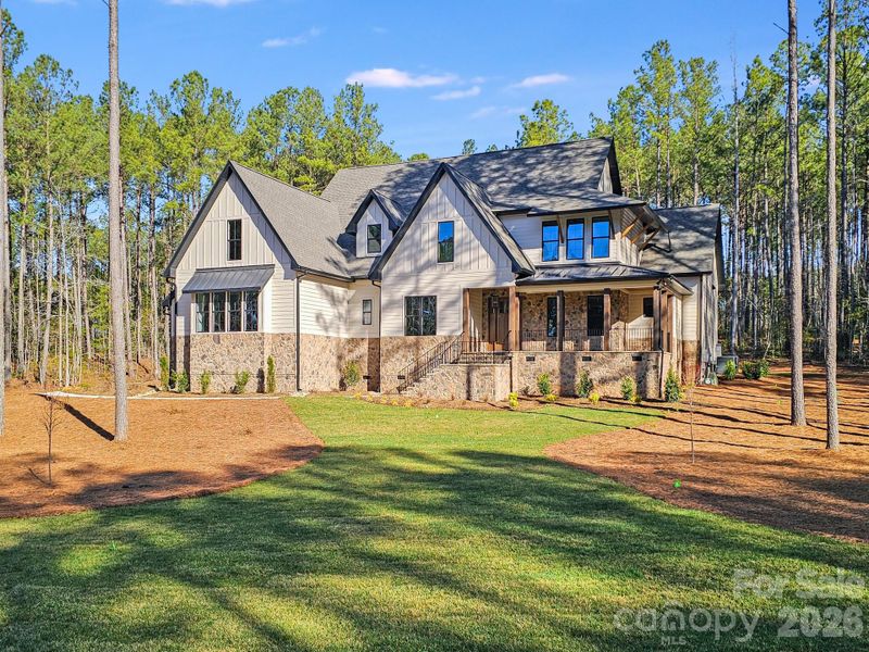 Front exterior of a new home in , Lancaster, SC, highlighting curb appeal (Image 27).