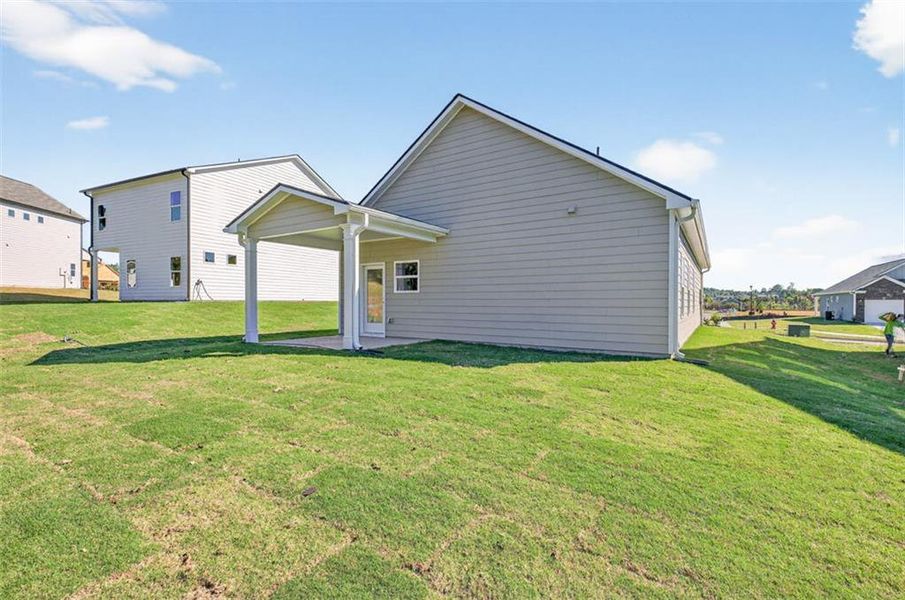 Exterior details and patio area of a home in Fair Oak, Calhoun (Image 17).