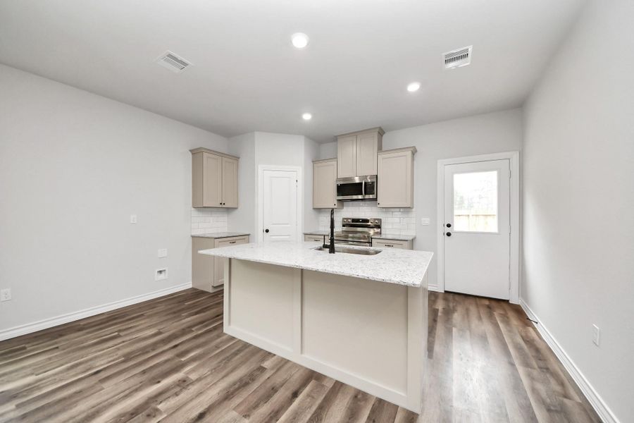 Furnished interior view inside a new home in The Enclave at Spring Branch, Montgomery (Image 6).
