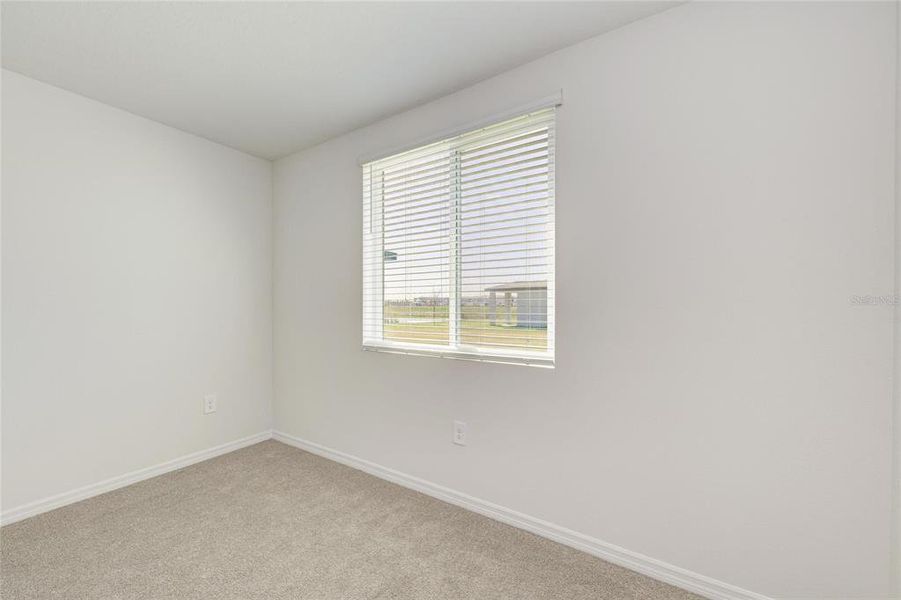 Spacious, unfurnished interior of a new home in Magnolia Bay - Classic Series, Nokomis (Image 32).