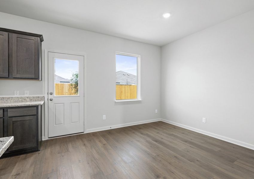 The dining room sits right off of the kitchen. The dining room sits right off of the kitchen.