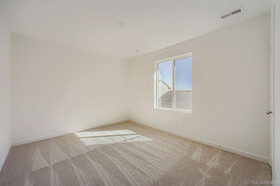 Spacious, unfurnished interior of a new home in Percheron: The Explorer Collection, Colorado Springs (Image 7).