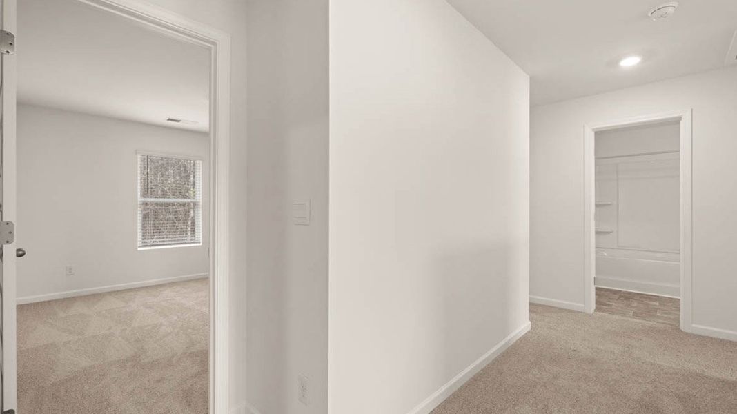 Representative unfurnished interior of a home built from the Packard by D.R. Horton in Evergreen Crossing, Locust Grove (Image 27).