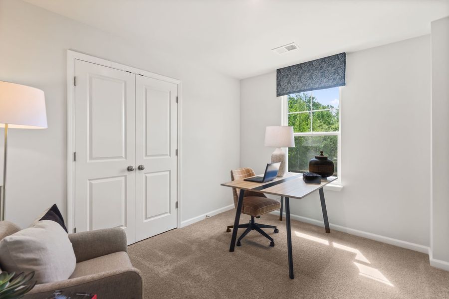 Representative furnished interior of a home built from the The Pointe by Stanley Martin Homes in Westbriar Woods Townhomes, Spartanburg (Image 27).