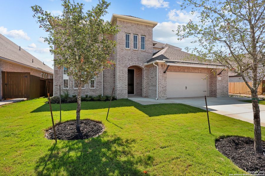 Front exterior of a new home in Stillwater Ranch 60', San Antonio, TX, highlighting curb appeal (Image 18).