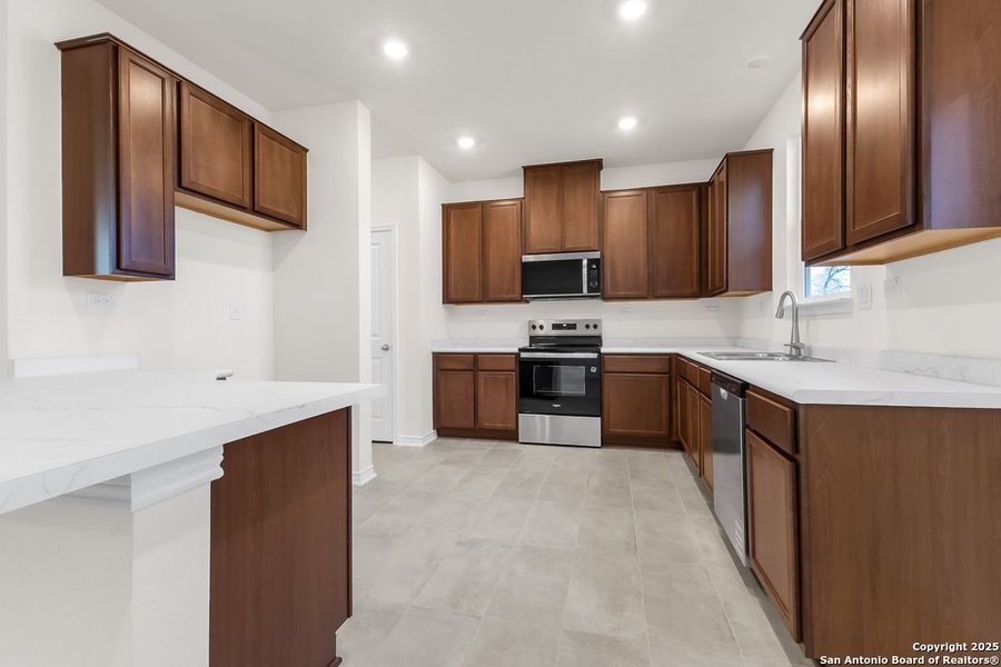 Furnished interior view inside a new home in Spanish Trails Villas, San Antonio (Image 7).