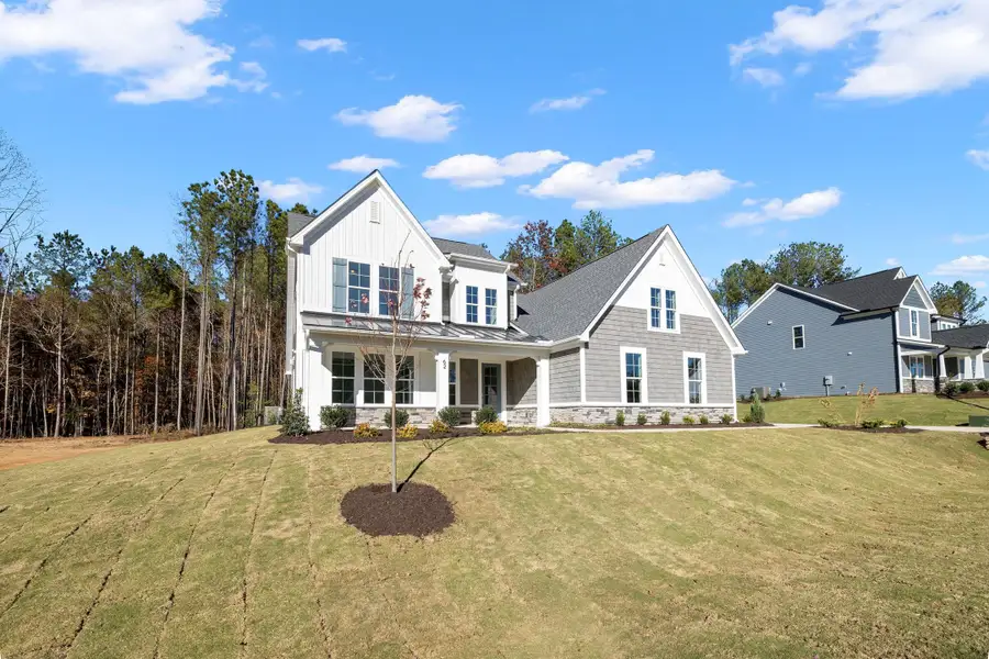 Representative exterior photo of a completed home built from the The Chandler by RobuckHomes in Baylee Ridge, Selma, NC (Image 42). Representative exterior photo of a completed home built from the The Chandler by RobuckHomes in Baylee Ridge, Selma, NC (Image 42).