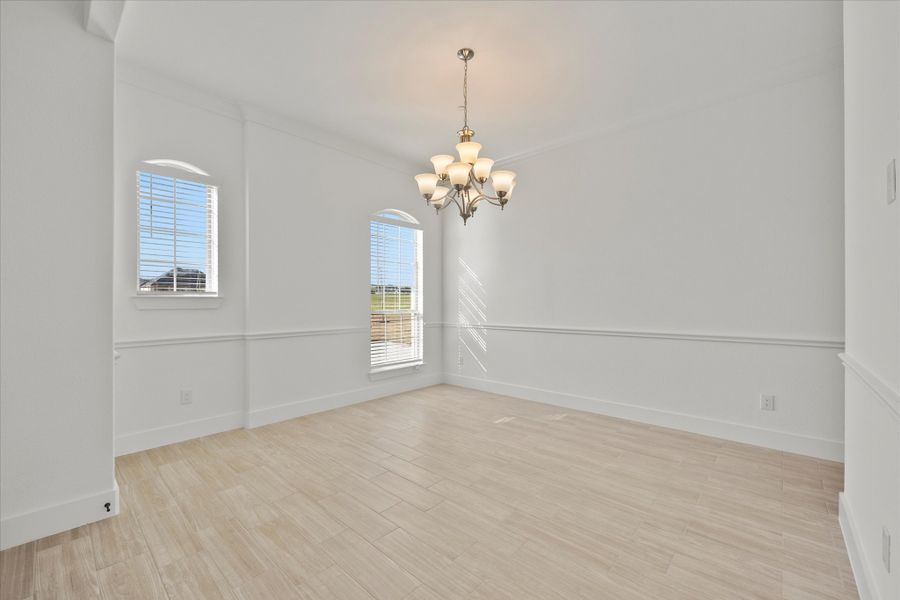 Representative unfurnished interior of a home built from the Davenport by Windsor Homes in Winding Creek, Rockwall (Image 19).