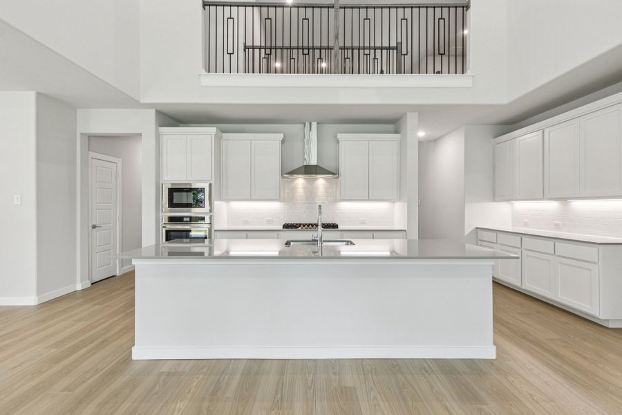 Kitchen in the Mercury home plan by Trophy Signature Homes – REPRESENTATIVE PHOTO Kitchen in the Mercury home plan by Trophy Signature Homes – REPRESENTATIVE PHOTO