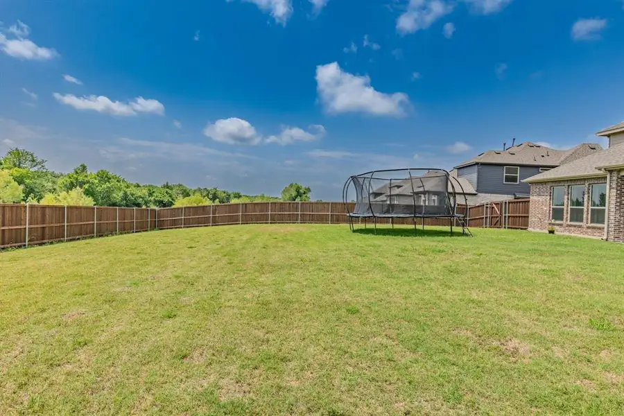 Exterior details and patio area of a home in Grayhawk Addition, Forney (Image 3).