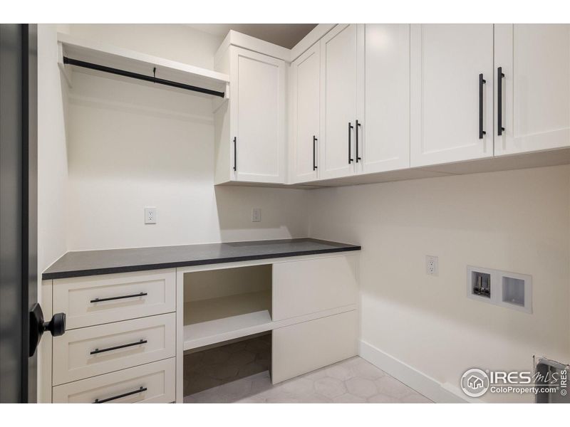 Upstairs laundry room, right off of the lofted living space
