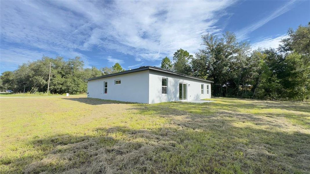 Front exterior of a new home in , Dunnellon, FL, highlighting curb appeal (Image 20).