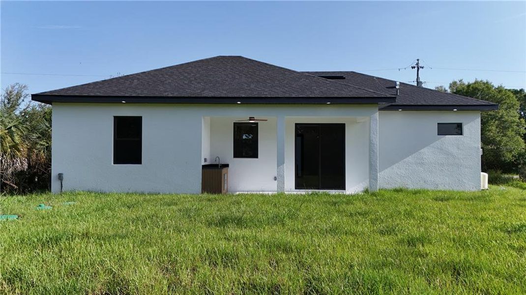 Exterior details and patio area of a home in , Lehigh Acres (Image 20). Exterior details and patio area of a home in , Lehigh Acres (Image 20).
