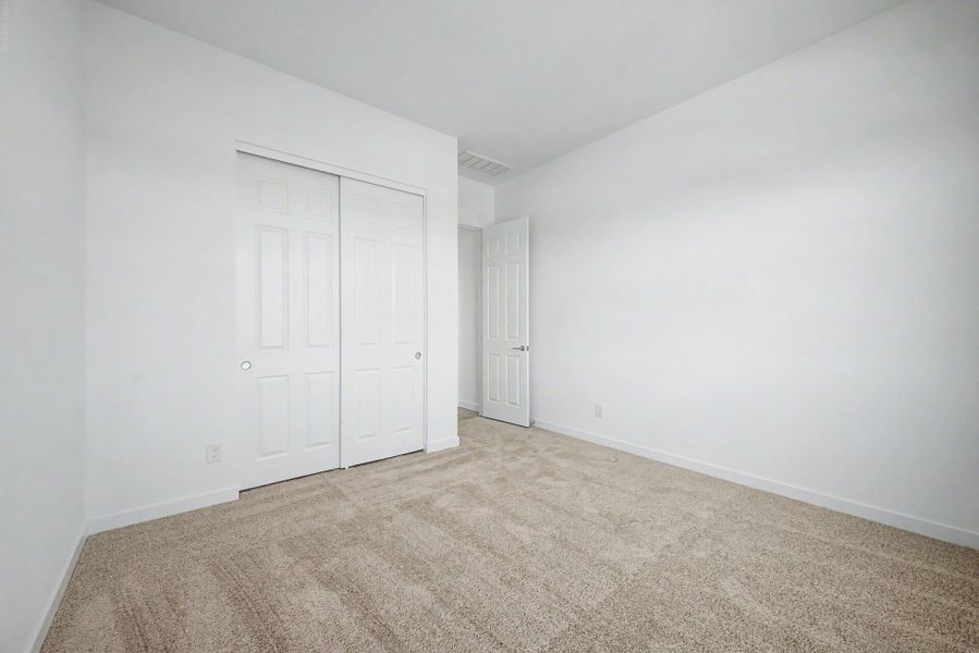 Spacious, unfurnished interior of a new home in Landmarke, San Tan Valley (Image 12).