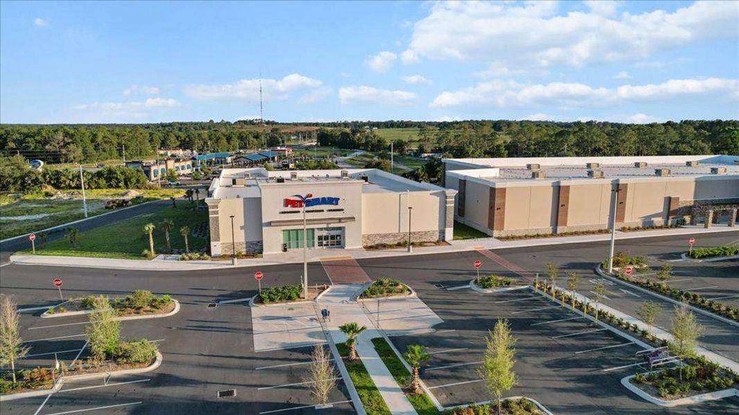 Front exterior of a new home in Twisted Oaks, Beverly Hills, FL, highlighting curb appeal (Image 20).