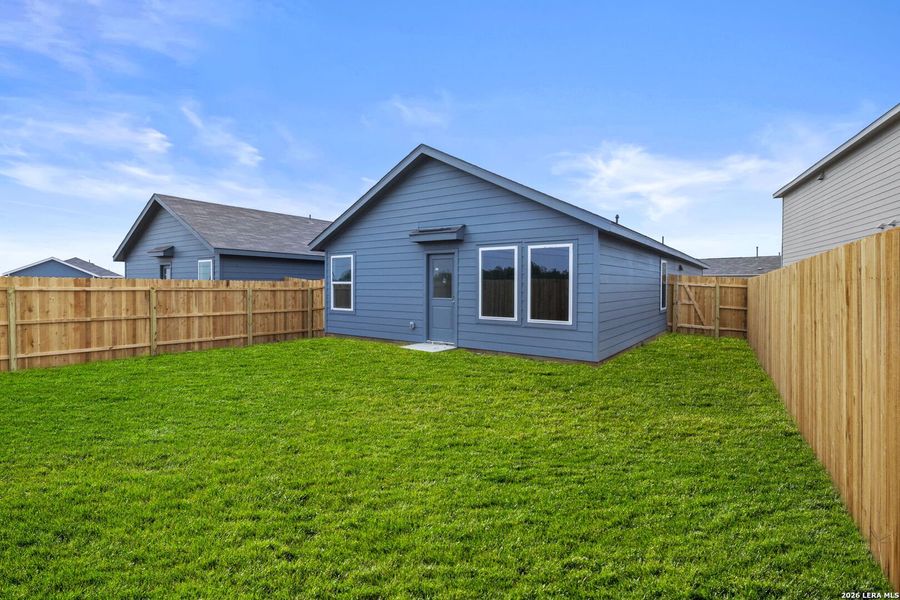 Exterior details and patio area of a home in Spring Grove, St. Hedwig (Image 15).