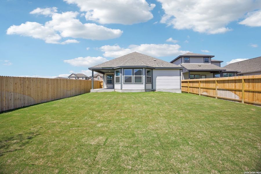 Exterior details and patio area of a home in Kallison Ranch, San Antonio (Image 24).