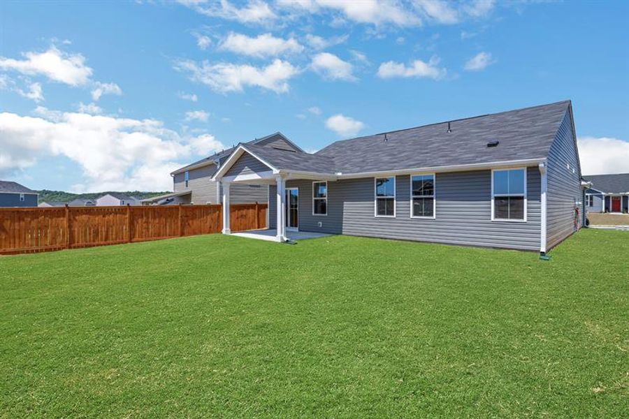 Exterior details and patio area of a home in Riverside at Calhoun, Calhoun (Image 3).