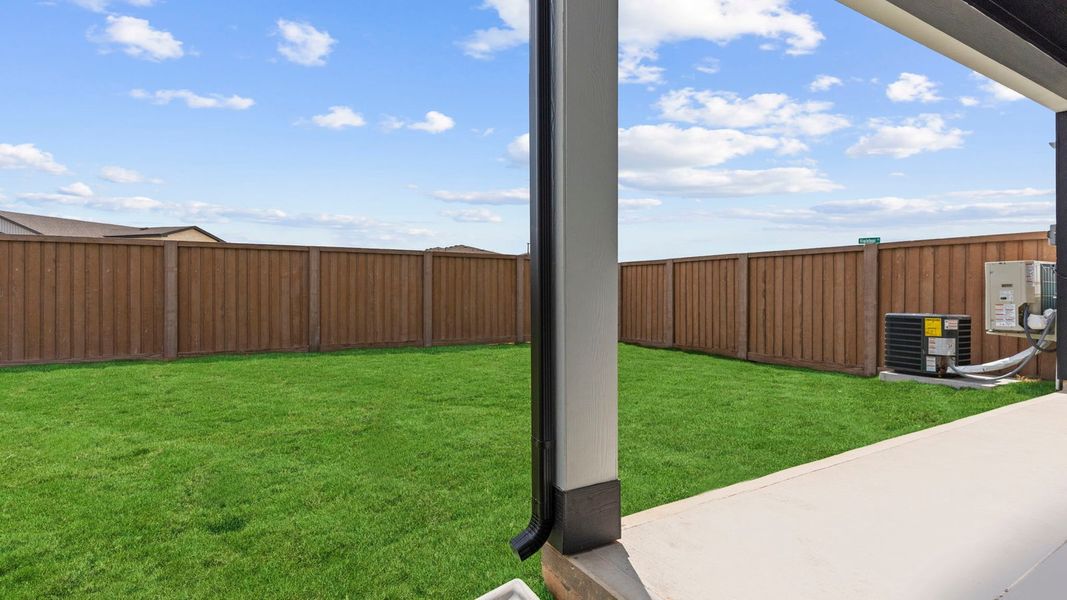 Exterior details and patio area of a home in Villarosa at Tamarron, Katy (Image 2). Exterior details and patio area of a home in Villarosa at Tamarron, Katy (Image 2).