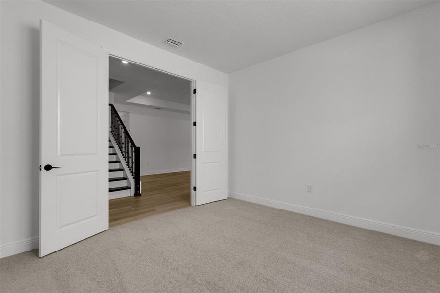 Spacious, unfurnished interior of a new home in Creeks Edge at Twin Rivers, Parrish (Image 49).