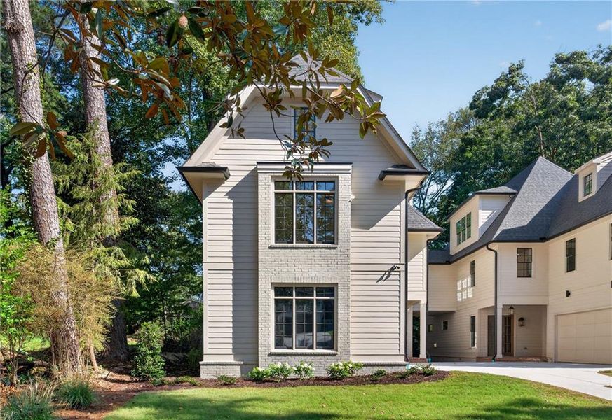 Front exterior of a new home in , Atlanta, GA, highlighting curb appeal (Image 27).