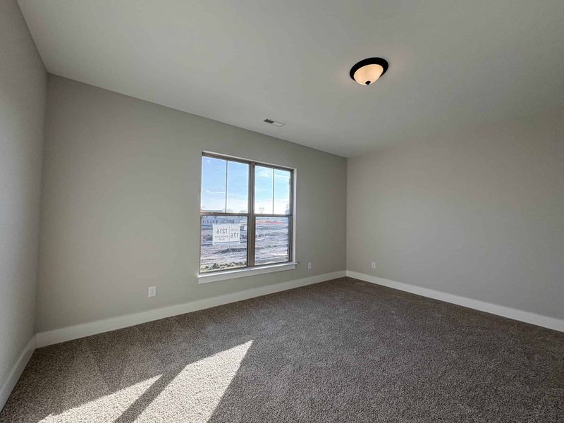 Spacious, unfurnished interior of a new home in The Paddock, Gallatin (Image 6).