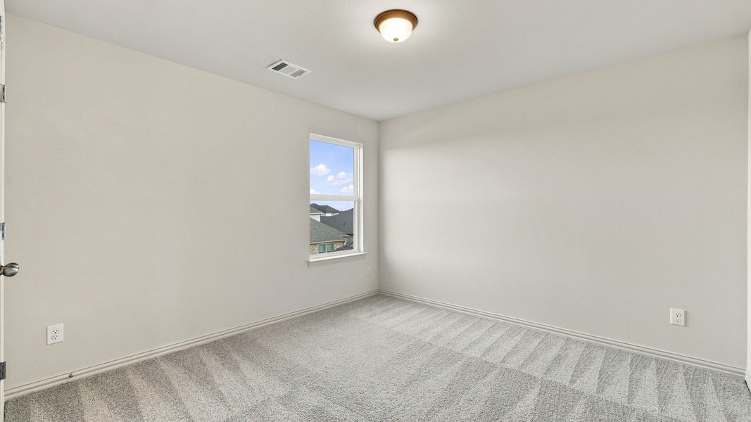 Furnished interior view inside a new home in Westridge Journey, McKinney (Image 9).