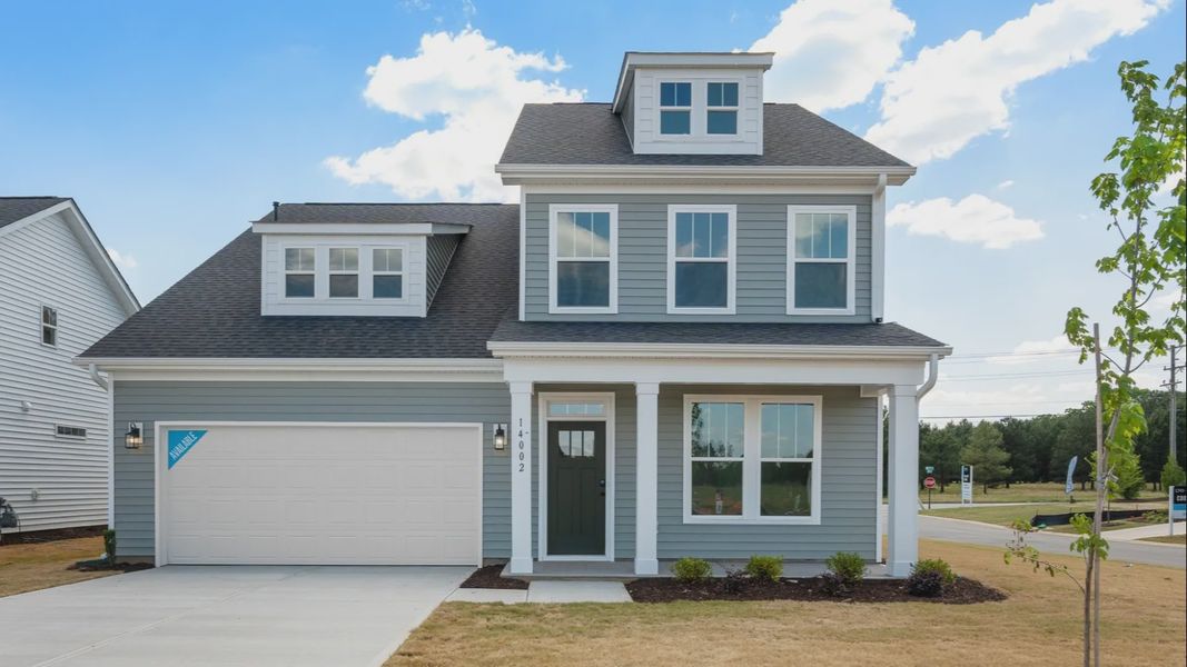 Representative exterior photo of a completed home built from the Augusta by DRB Homes in Iris Meadows, Moore, SC (Image 26).