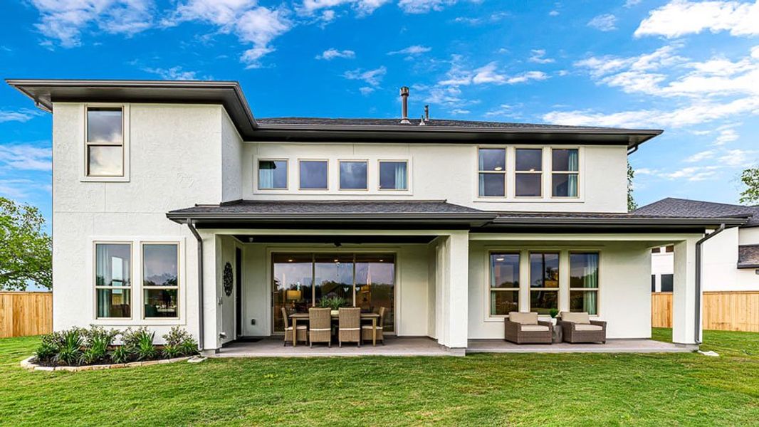 Representative exterior photo of a completed home built from the Carnelian by Taylor Morrison in Avalon at Cypress 60s, Cypress, TX (Image 22). Representative exterior photo of a completed home built from the Carnelian by Taylor Morrison in Avalon at Cypress 60s, Cypress, TX (Image 22).