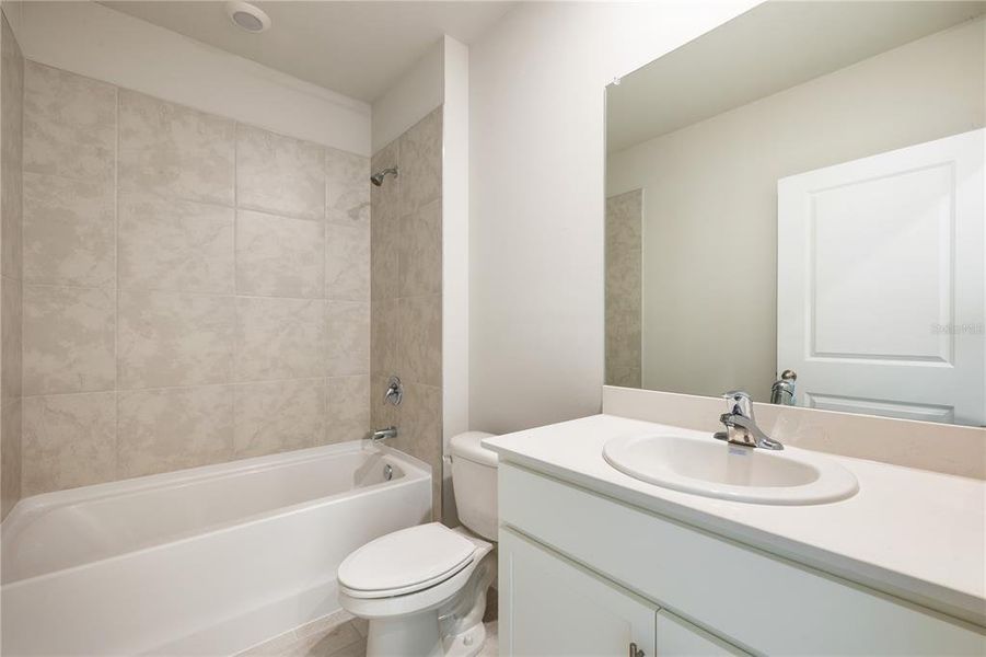 Furnished interior view inside a new home in Coral Lakes - Tradition & Express, Punta Gorda (Image 9). Furnished interior view inside a new home in Coral Lakes - Tradition & Express, Punta Gorda (Image 9).