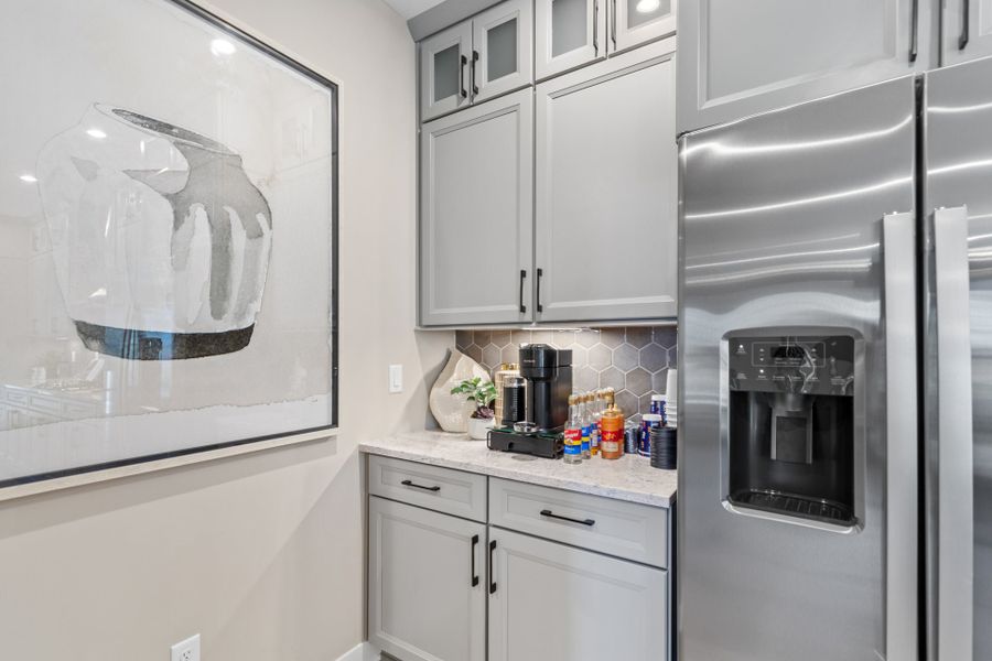Representative furnished interior of a home built from the Huxley by Fischer Homes in Veranda Manor, Canton (Image 15).