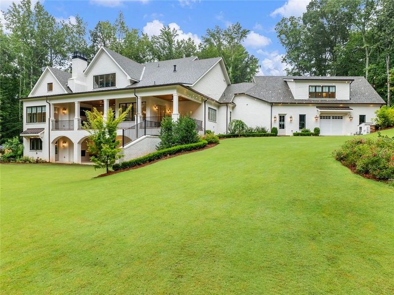 Front exterior of a new home in , Buford, GA, highlighting curb appeal (Image 1). Front exterior of a new home in , Buford, GA, highlighting curb appeal (Image 1).