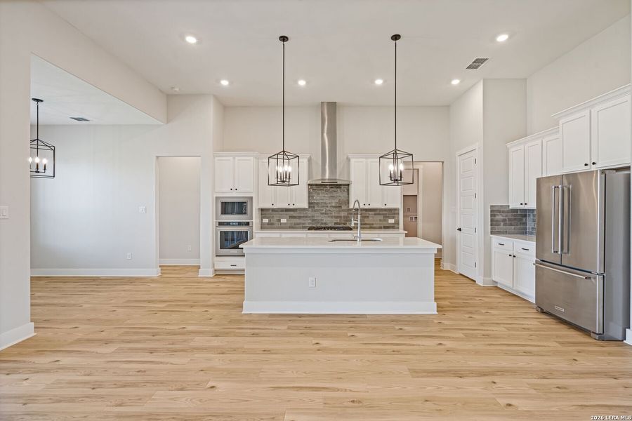 Furnished interior view inside a new home in Potranco West, Castroville (Image 8).