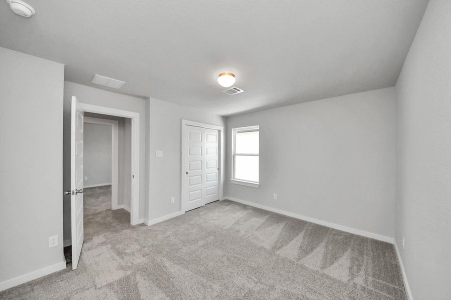 Generously sized secondary bedrooms, complete with spacious closets and soft, inviting carpeting. Enjoy abundant natural light streaming in through the large windows, complemented by privacy blinds for your personal sanctuary. Generously sized secondary bedrooms, complete with spacious closets and soft, inviting carpeting. Enjoy abundant natural light streaming in through the large windows, complemented by privacy blinds for your personal sanctuary.