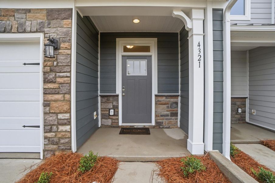 Exterior details and patio area of a home in Harrisburg Village Townhomes, Harrisburg (Image 2). Exterior details and patio area of a home in Harrisburg Village Townhomes, Harrisburg (Image 2).