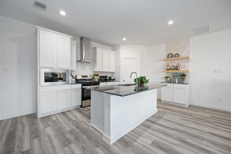 Representative Photo. Arlo townhome floor plan at Alexander Townhomes with 4 bedrooms and 2-car garage. Representative Photo. Arlo townhome floor plan at Alexander Townhomes with 4 bedrooms and 2-car garage.