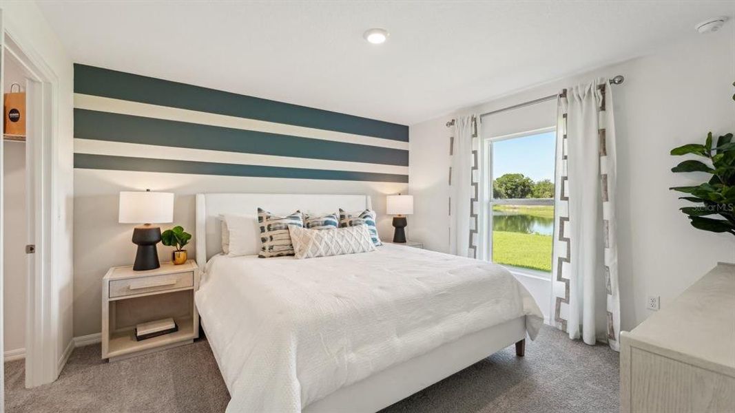 Furnished interior view inside a new home in Triumph South, Wildwood (Image 23).