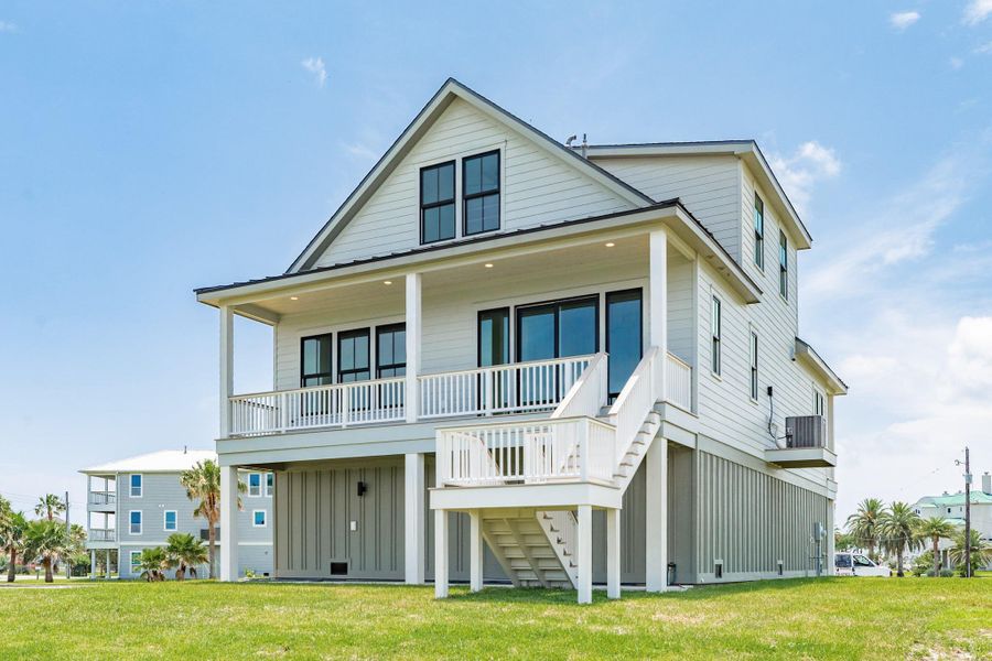 Front exterior of a new home in , Galveston, TX, highlighting curb appeal (Image 25).