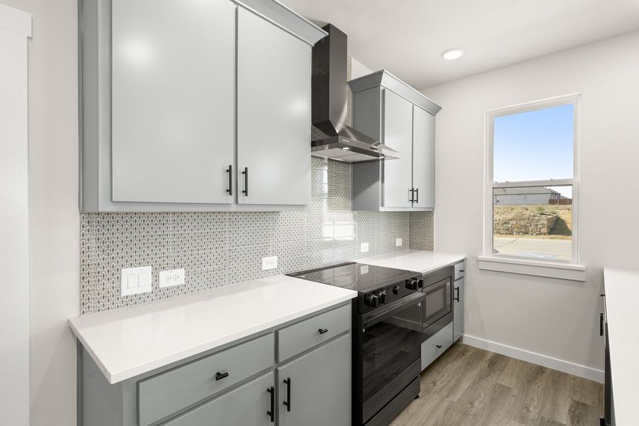 Furnished interior view inside a new home in Wildridge, Oak Point (Image 10).