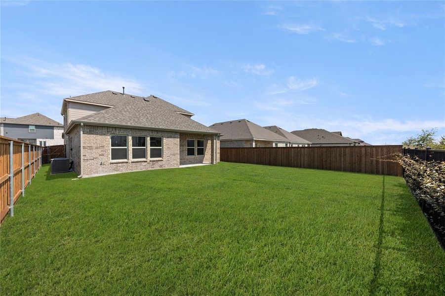 Front exterior of a new home in Las Lomas, Heath, TX, highlighting curb appeal (Image 1).