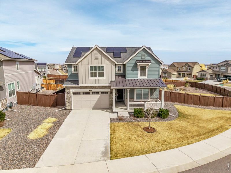 Front exterior of a new home in , Thornton, CO, highlighting curb appeal (Image 2). Front exterior of a new home in , Thornton, CO, highlighting curb appeal (Image 2).