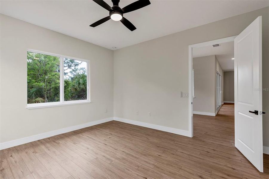 Spacious, unfurnished interior of a new home in , Port Charlotte (Image 26).