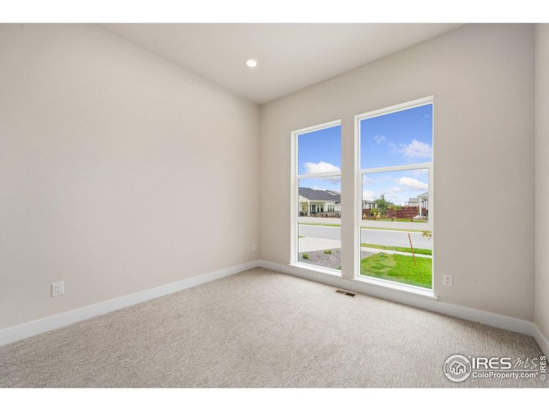 Spacious, unfurnished interior of a new home in Festival at RainDance, Windsor (Image 12).