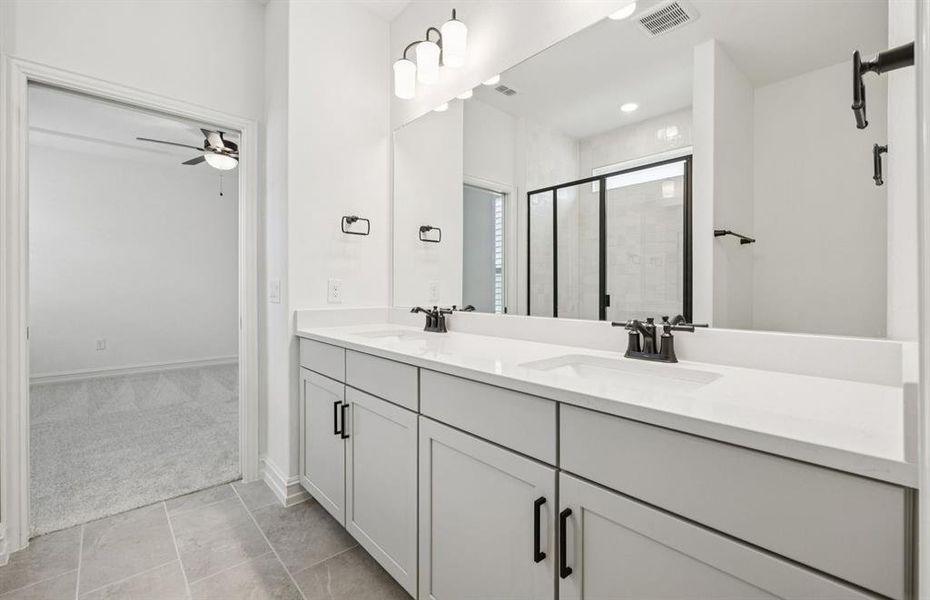 Double vanity in owner's bath.