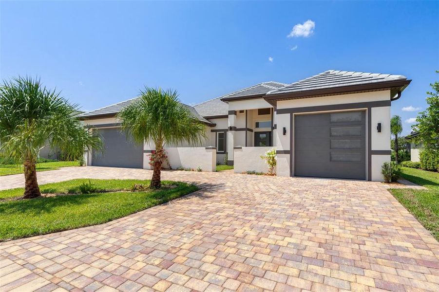 Front exterior of a new home in , Palm Coast, FL, highlighting curb appeal (Image 28).