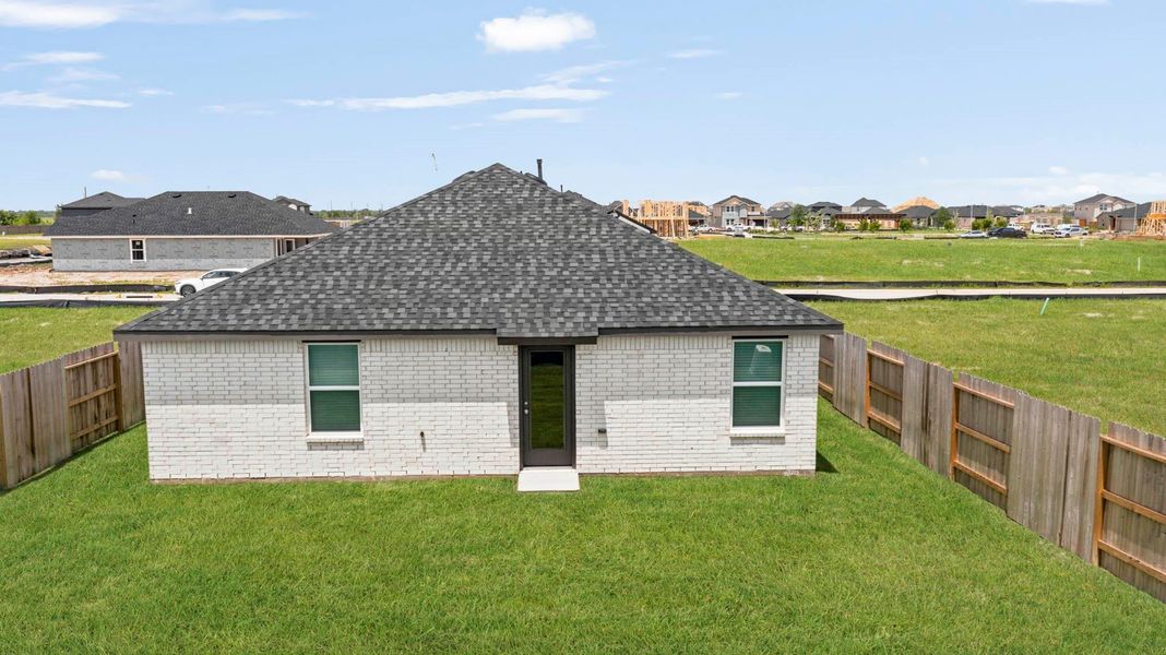 Exterior details and patio area of a home in Sunterra Lakes, Brookshire (Image 16). Exterior details and patio area of a home in Sunterra Lakes, Brookshire (Image 16).