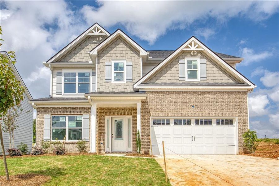 Front exterior of a new home in Neely Farm, Covington, GA, highlighting curb appeal (Image 23). Front exterior of a new home in Neely Farm, Covington, GA, highlighting curb appeal (Image 23).
