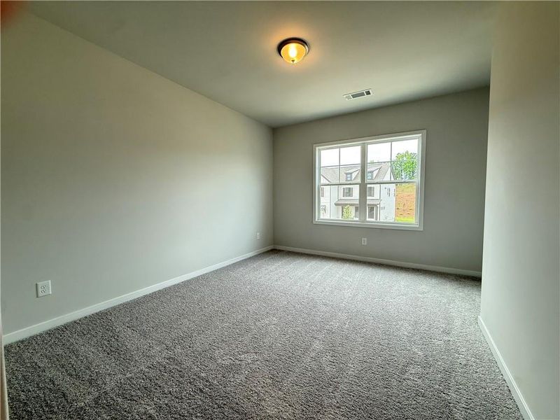 Spacious, unfurnished interior of a new home in Ponderosa Farms Manor, Gainesville (Image 33).