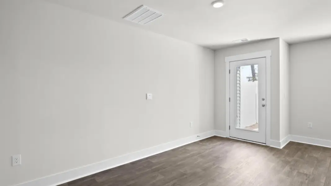 Spacious, unfurnished interior of a new home in The Townes at Cedar Hill Landing, Navassa (Image 15).