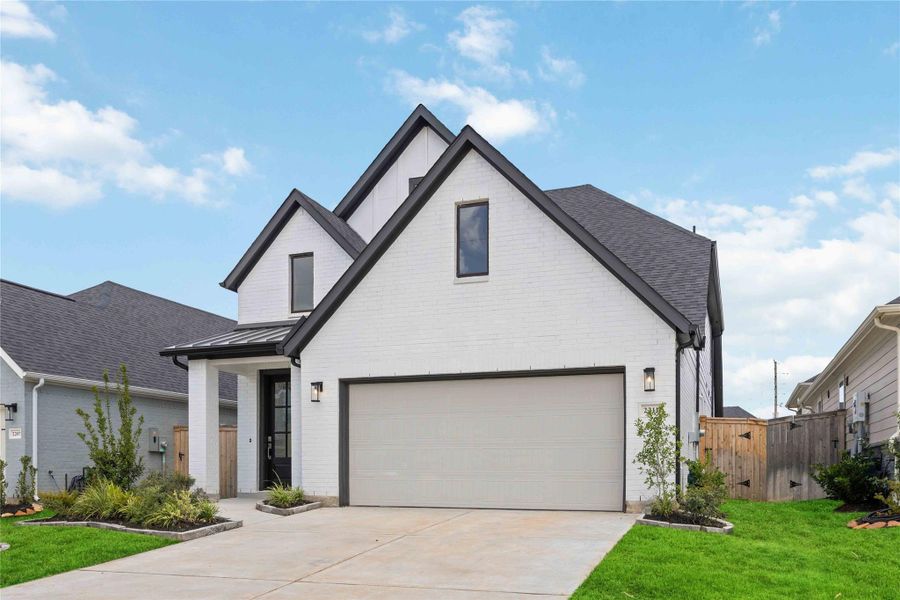 Front exterior of a new home in Jordan Ranch, Katy, TX, highlighting curb appeal (Image 2). Front exterior of a new home in Jordan Ranch, Katy, TX, highlighting curb appeal (Image 2).